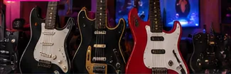 Plastic guitar controllers in an arcade